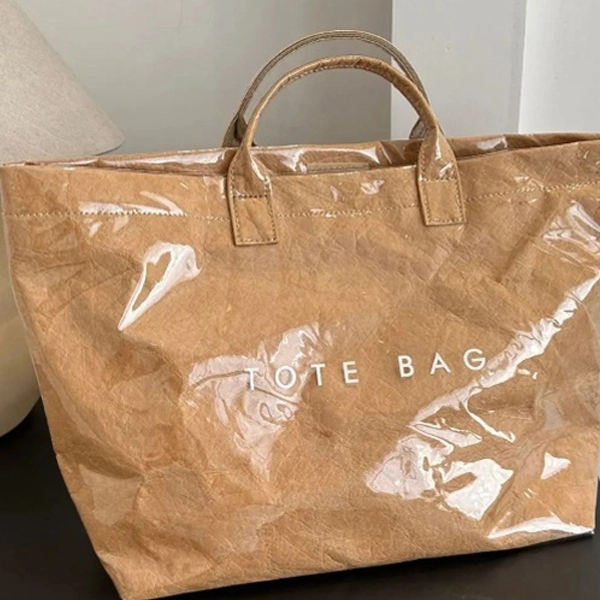 Fashion Washable Kraft Paper Tote Bag With Clear PVC Cover And Polyester Lining